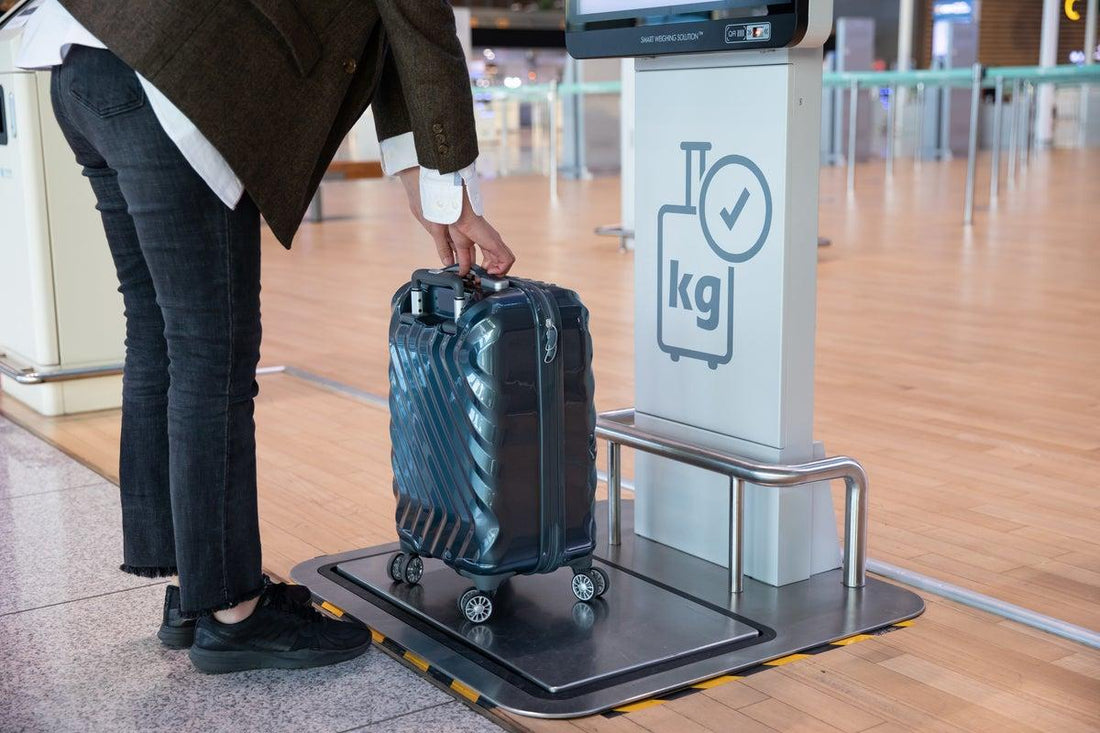 How to Avoid Airline Overweight Fees with a Luggage Scale