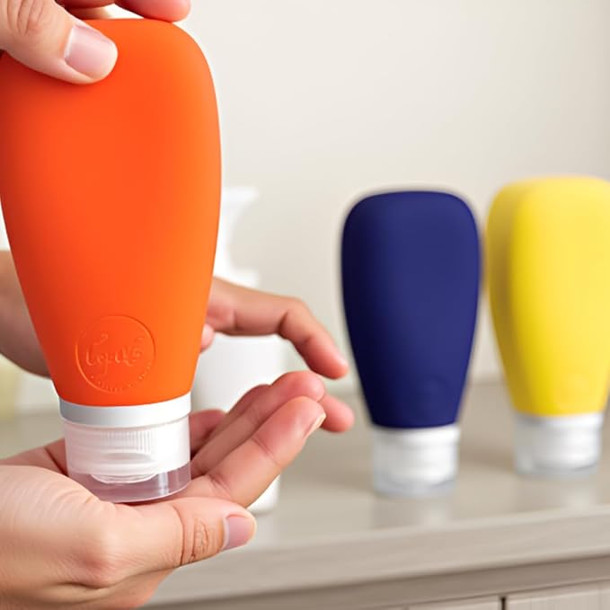 Travel Bottles for Toiletries, TSA Approved 3oz Leak Proof Silicone Refillable Squeeze Travel Size Containers BPA Free for Cleansers, Lotions, Shampoo 3pk (Orange-Blue-Yellow). - Image 3