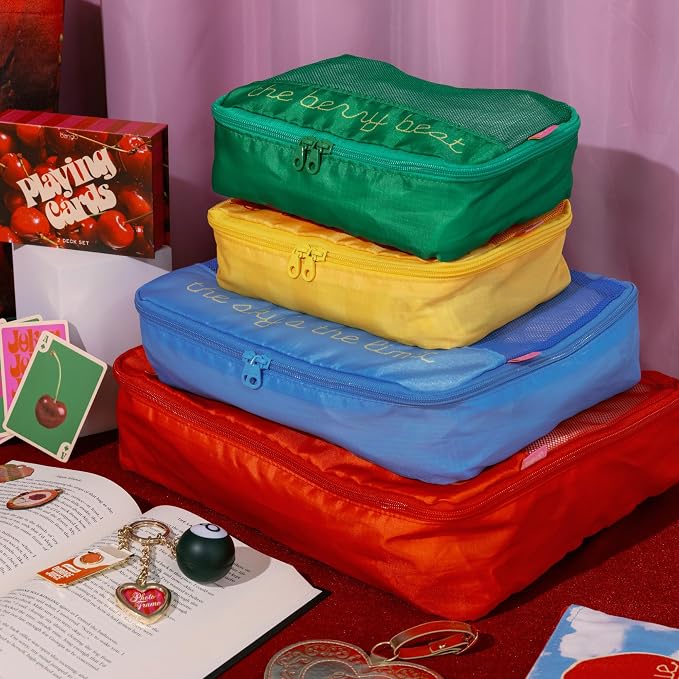 ban.do Packing Cube Set of 4, Colorblock Fruits | Polyester and Mesh Packing Organizers, Includes 4 Foldable Luggage Packer Bags in Various Sizes with Quote/Fruit Designs - Image 7
