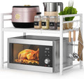 DOLALIKE Expandable Microwave Stand Kitchen Countertop Organizer, White | Adjustable Microwave Oven Rack Metal Storage Shelf with 3 Hooks for Pans Small Appliances Kitchen Utensils Tableware, 2-Tier by DOLALIKE